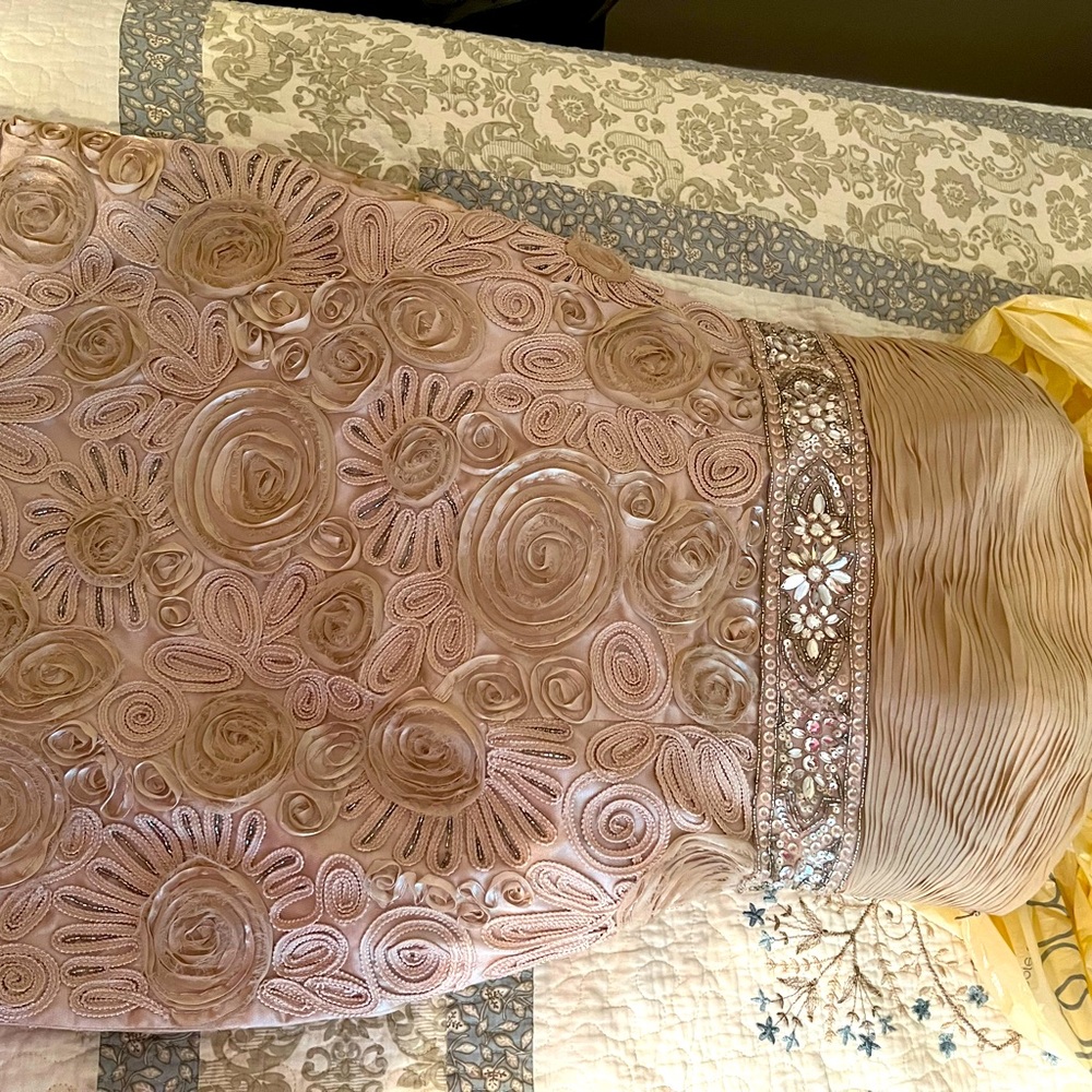 Occasion dress, or nighttime. Full of detail, beautiful sequins dress.Strapless